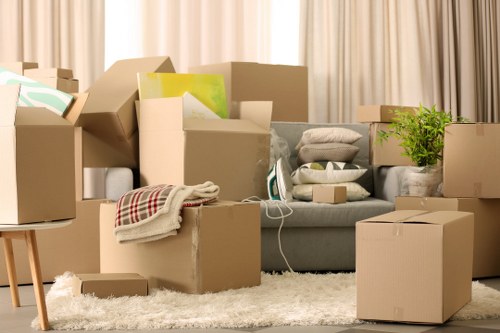 Home movers carrying items from a Kingston upon Thames property